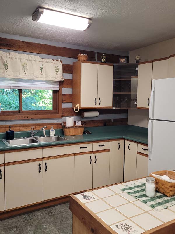 kitchen, white cabinets, green countertop
